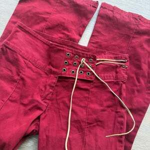 Vintage Y2K Red Denim Grommet Lace-Up Flare Pants
